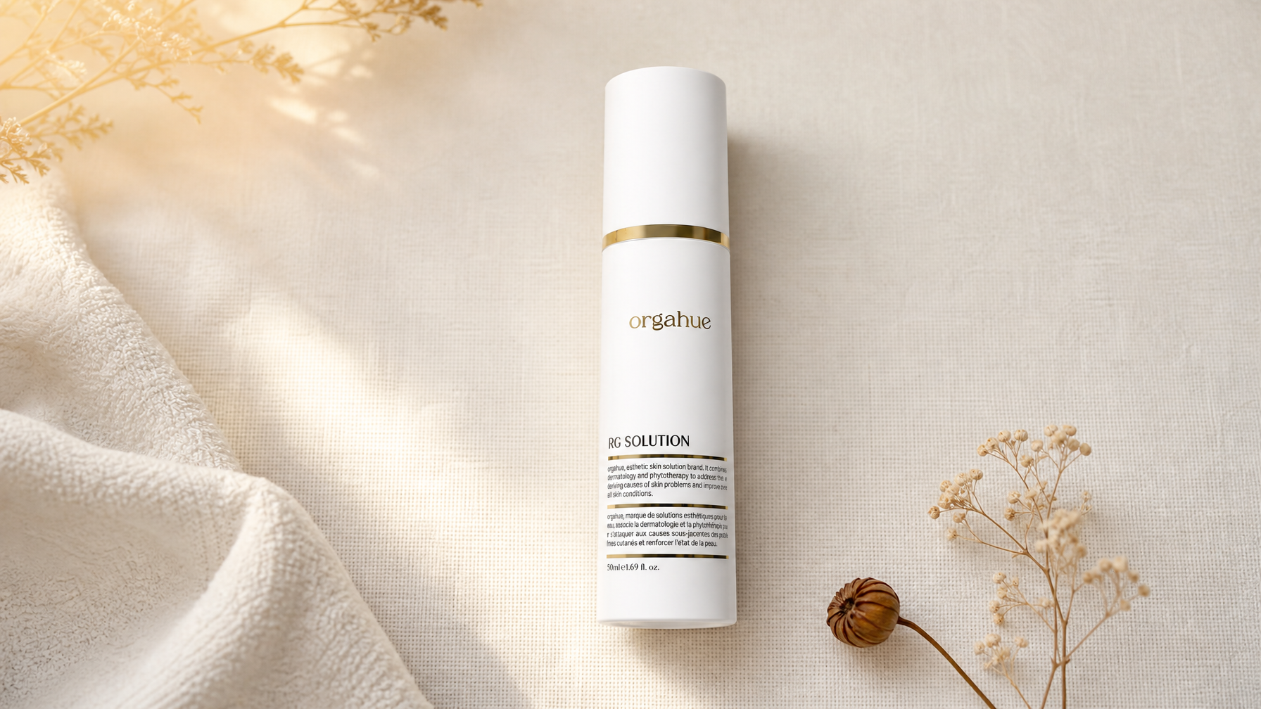 Orgahue RG Solution peptide moisturizer on cream linen, Beauty Power editorial flat lay