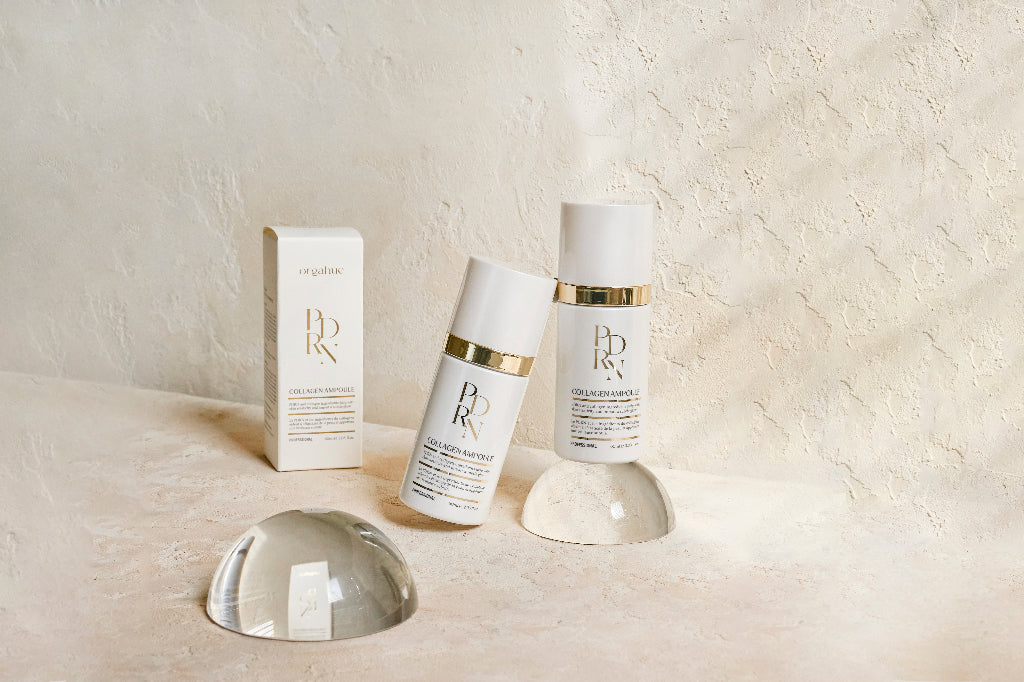 Orgahue PDRN Collagen Booster Ampoule Mist with packaging on cream linen. Beauty Power Korean skincare guide 2026